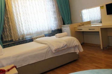 Üç Kişilik Oda